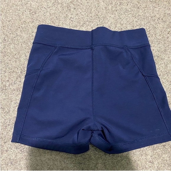 Like NEW Ladies Purple Pink Under armour shorts XS biking track running yoga - Picture 3 of 6